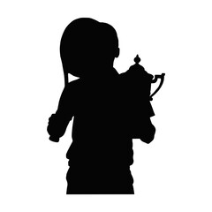 Silhouette of a young girl carrying a large trophy on her shoulder