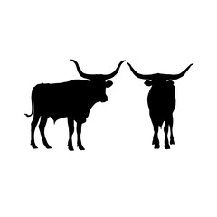Two longhorn cattle silhouettes standing together in black and white