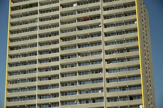 High-rise apartment building with balconies and satellite dishes, satellite town of Chorweiler in Cologne, North Rhine-Westphalia, Germany