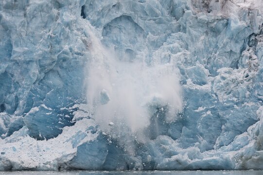 Calving glacier, edge of Monacobreen, Liefdefjord, Woodfjord area, Spitsbergen Island, Svalbard and Jan Mayen archipelago, Norway
