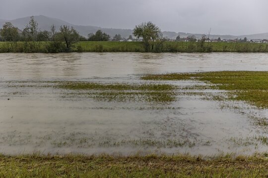 Flood on a river, storm on 26.8.23 near Benediktbeuern, Loisach near Schlehdorf, Bavaria, Germany