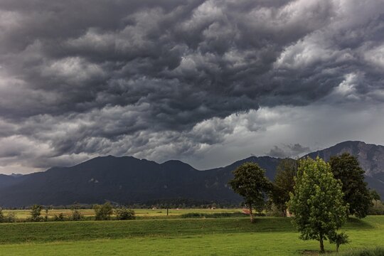 Dark storm clouds during a thunderstorm, storm, summer, mountain landscape, Loisach-Lake Kochel-Moore, Bavaria, Germany