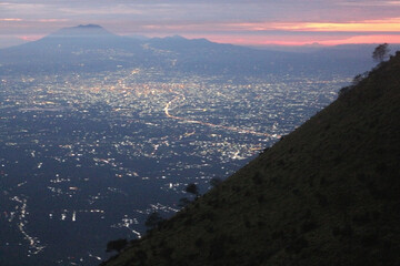 Nightfall Over the City from the Mountain Ridge