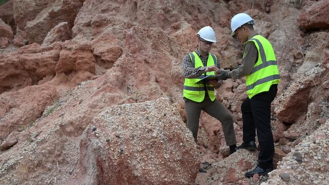 Geologist surveying mine,Explorers collect soil samples to look for minerals, A geologist is a scientist who studies the Earth's physical structure and substances