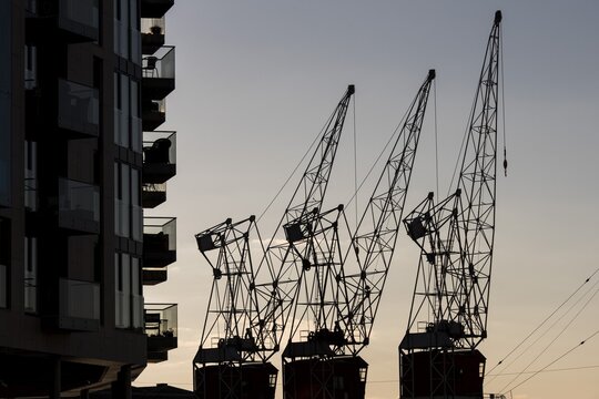 Modern apartment blocks, cranes, Tjuvholmen, Aker Brygge, Oslo, Norway