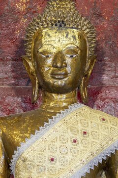 Golden Buddha statue, Bhumispara-mudra, Buddha Gautama at the moment of enlightenment, Wat Long Koon, Luang Prabang, Laos