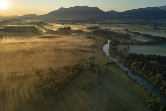 Aerial view of a moor landscape with river in front of mountains, morning light, backlight, view of Zwiesel, Loisach, Alpine foothills, Bavaria, Germany