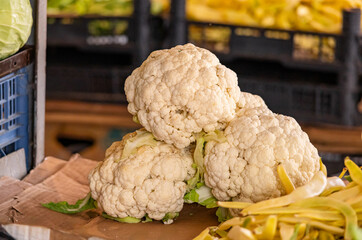Farmers Market Fresh fruit and vegetables for sale at a Farmers Market. Romanesco broccoli. Roman cauliflower. Orange Cauliflower. cheddar cauliflower. Purple Cauliflower. Fresh Produce for sale.
