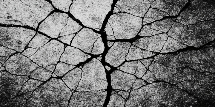 Dry cracked earth texture is an abstract pattern of brown arid clay soil from a drought
