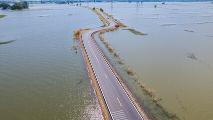 road with water on both sides