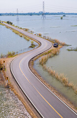 road with water on both sides