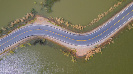 road with water on both sides
