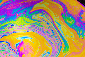 Psychedelic multicolored background abstract. Rainbow colors. patterns background. Photo macro shot of soap bubbles