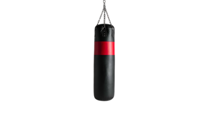 Black boxing bag hangs, with red band, isolated on dark background