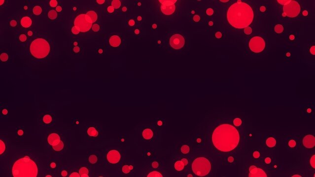 Abstract red glowing bokeh lights on a dark background creating a vibrant