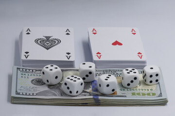 Two decks of cards arranged on a white background and dices.