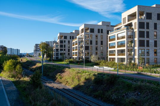A wide angle view of contemporary architecture and urban housing shaping new development within the loren district of Oslo, Norway, embraced by extensive green areas