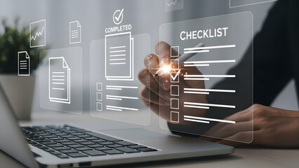 Person checking off items on a digital checklist displayed on a transparent screen