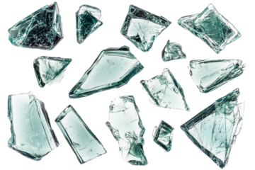 Numerous sharp, translucent fragments of broken glass, showing a subtle blue-green tint, are scattered randomly across a bright white surface, evoking concepts of fragility and hazard