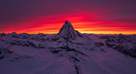 Naklejka premium Matterhorn Peak at Sunrise: A Majestic Alpine Scene