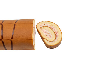 Sponge Swiss roll and a single slice separated on white background. Strawberry cream spiral filling with chocolate stripe decoration, studio lighting.