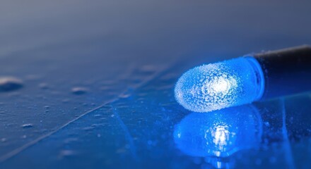 Blue light emitting diode with frost crystals macro close up detail