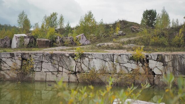 Petelinsky marble quarry. An old marble quarry filled with water. Hand held. Siberia.

