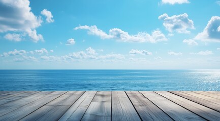 Wide View of Calm Ocean Under Clear Sky With Scattered Clouds and Wooden Deck in Foreground