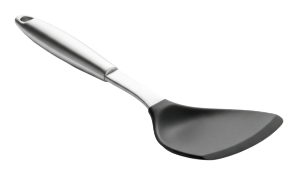 Cooking event using a spatula in the kitchen culinary environment