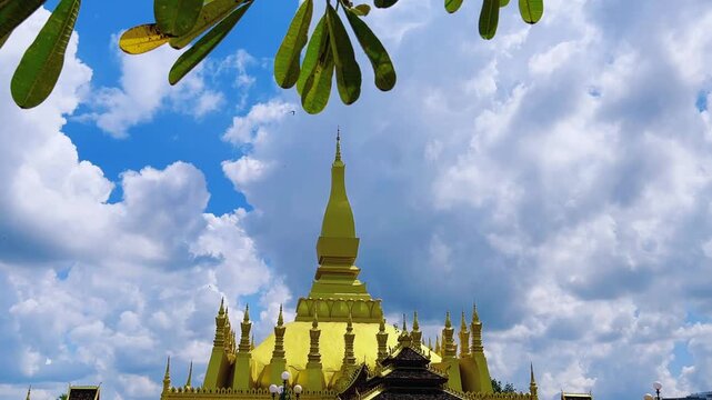 Pha That Luang Stupa is a famous landmark in Vientiane, Laos. Asia. Golden Stupa. Buddhist religious structure. Residence of the Lao Buddhist Patriarch. 4K	