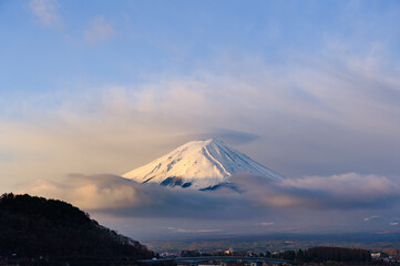 Fuji mountain at Lake Kawaguchiko in Yamanashi, Japan. Mount Fujisan with cloud cap on the peak in the morning.