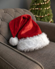 santa claus hat on a sofa