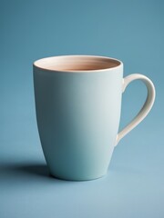 Obraz premium Matte mug on a pastel blue surface