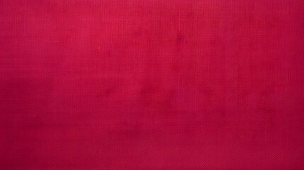 Fototapeta premium Deep pink textured background with a fine, interwoven pattern, providing a rich and detailed surface for use in design and artistic projects