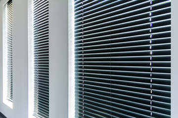 Closed Window Blinds With Horizontal Slats In Bright Modern Interior