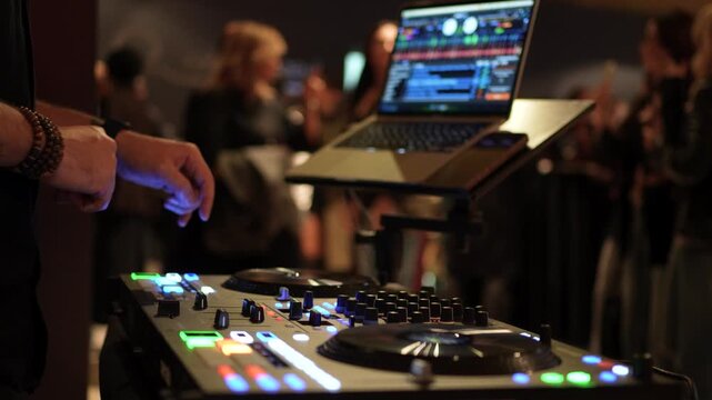 DJ Mixing Music at a Night Club Event