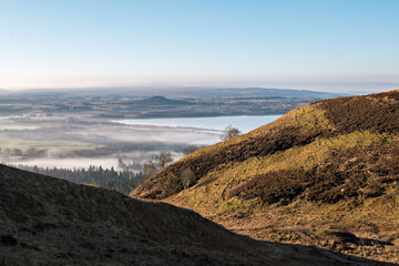 Misty view to Duncryne Hill from Conic Hill above Balmaha, Scottish Highlands.
