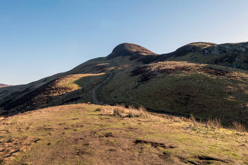 Conic Hill,  East Bank of Loch Lomond, Scottish Highlands. The West Highland Way can be seen on the flanks of the lumpy hill.
