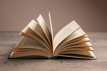 open book on wooden background
