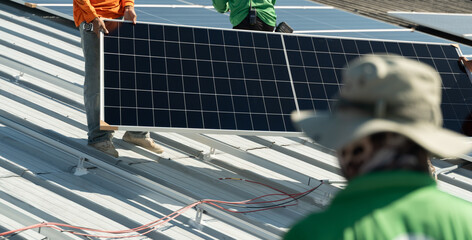 Solar panel installation in progress on a residential rooftop during bright sunshine