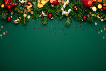 Christmas background with xmas tree, Christmas red golden ornament and sparkle bokeh lights on...