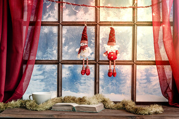 christmas cozy interior background with window sill illuminated with lights