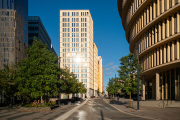 A refined facade and strong reflection define urban architecture across Hagastaden, where buildings rise through a Stockholm skyline shaped by perspective and consistent contemporary design choices