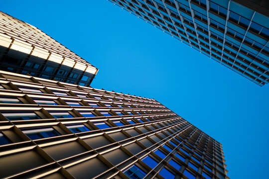 Stockholm buildings in Hagastaden present urban architecture marked by reflection and perspective, creating a skyline whose facade expresses a confident contemporary design direction