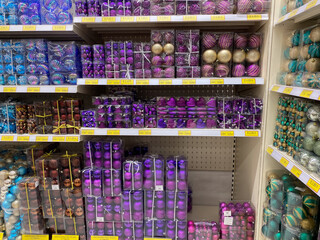 Colorful christmas ornament display in retail store for holiday decorations