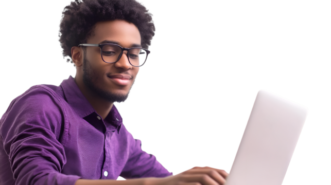 Young black man with glasses wearing a purple shirt smiling while typing on a silver laptop isolated on transparent background