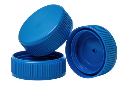 Three blue plastic bottle caps with ribbed edges arranged on a black background isolated on a transparent background - Powered by Adobe