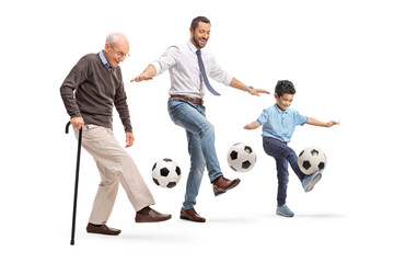 Grandfather, father and son juggling with footballs