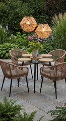 Fototapeta premium Modern patio dining set with hanging lights in garden