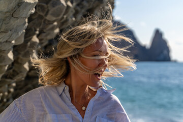 Woman Coast Windswept Hair Seascape: Sunny Day Coastal Relaxation, Breathtaking View.